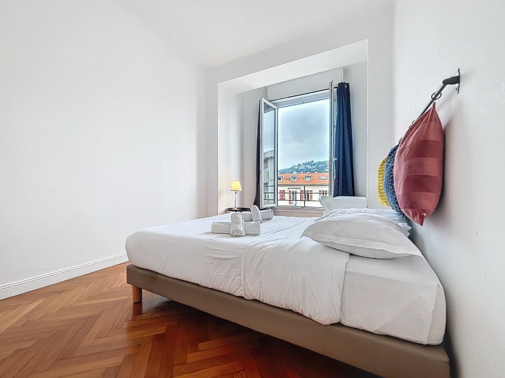 Chambre · Vue quartier